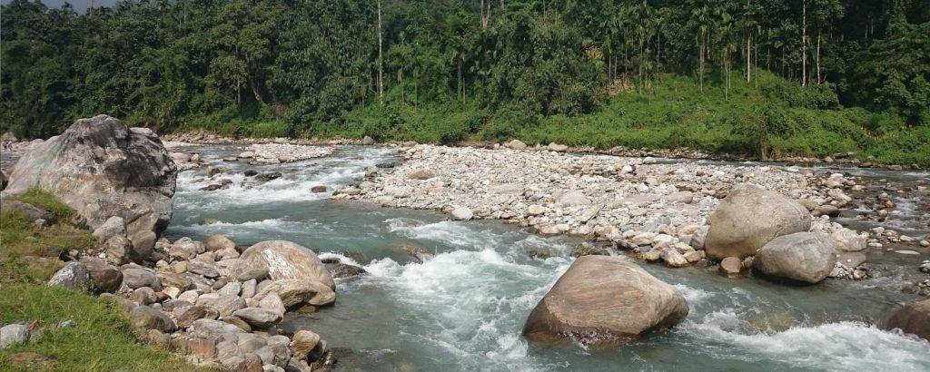 Murti River with blue waters flowing through the valley