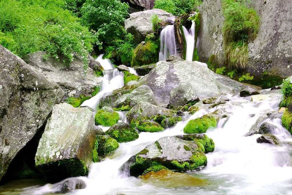 Milky waters flowing through Jogini Falls at Manali