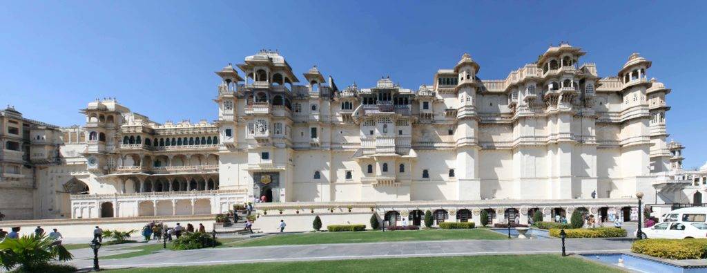 Udaipur City Palace under a clear blue sky