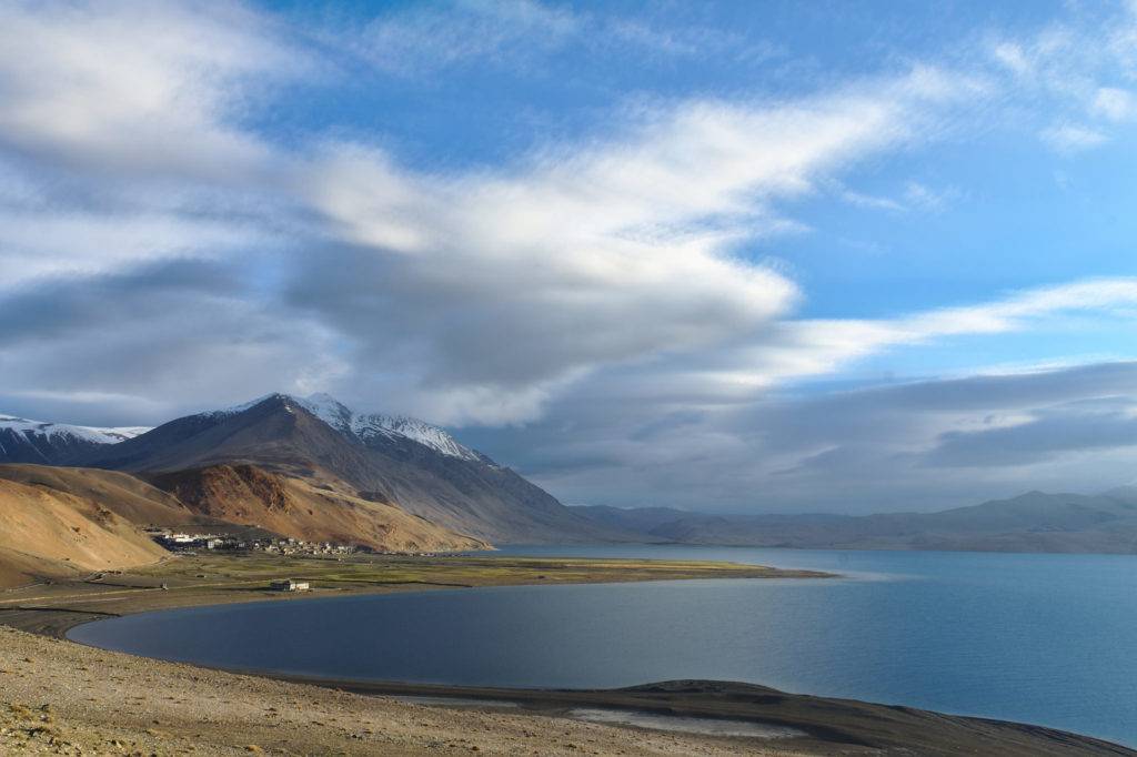 Blue waters of Tso Moriri Lake surrounded by mountains