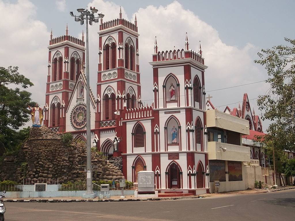 white and maroon building of Pondicherry Basilica Of The Sacred Heart Of Jesus