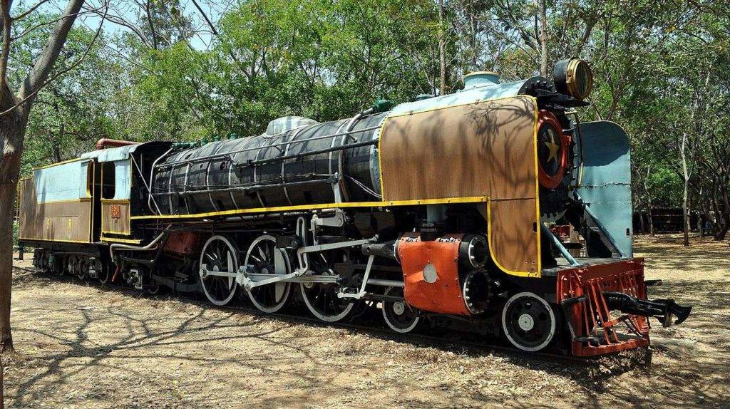 An old steam engine at display in Mysore Railway Museum