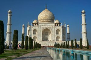 White Marble structure of Taj Mahal under a clear blue sky