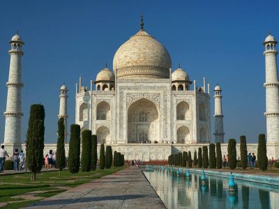 White Marble structure of Taj Mahal under a clear blue sky