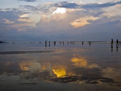 Reflection of evening sunlight on thewaters at Digha beach