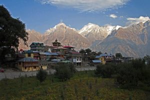 Kalpa town with snow capped mountains in the background