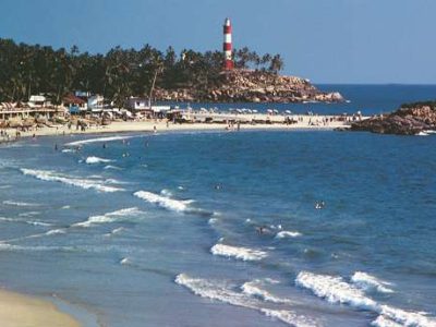 The lighthouse amidst the blue waters at the Lighthouse Beach
