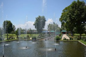 Fountains and gardens at Shalimar Bagh under clear blue sky