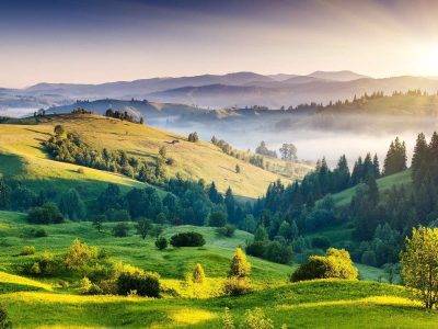 Sunlight on Kodaikanal Hills in a Misty Morning